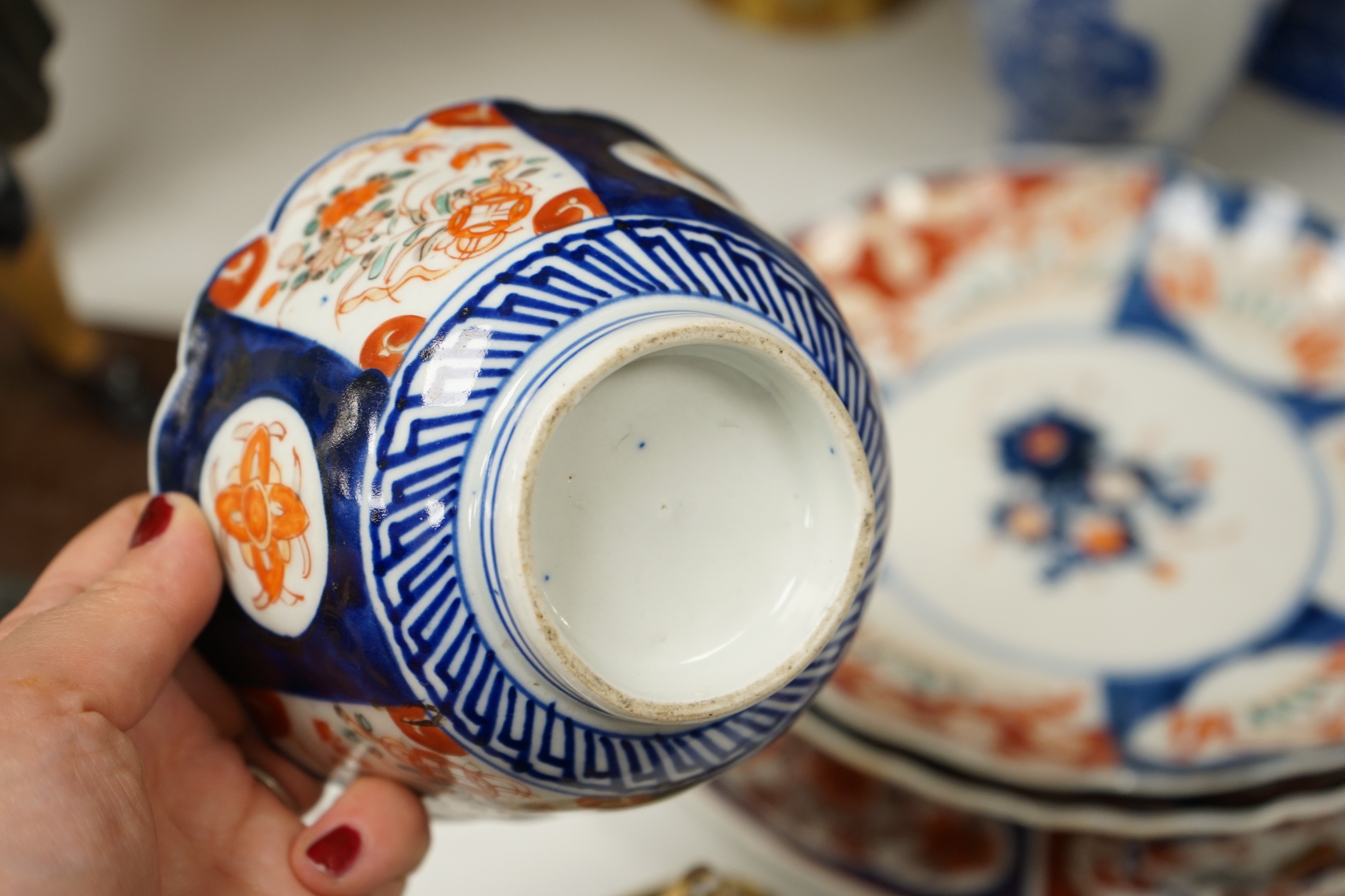 A group of Japanese ceramics to include Imari dishes a Seto ware blue and white vase etc. tallest 30cm